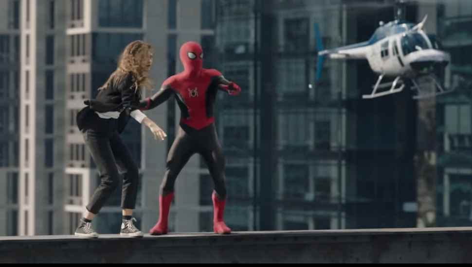 two people on a building