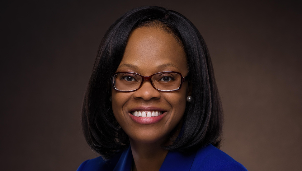 smiling woman with glasses