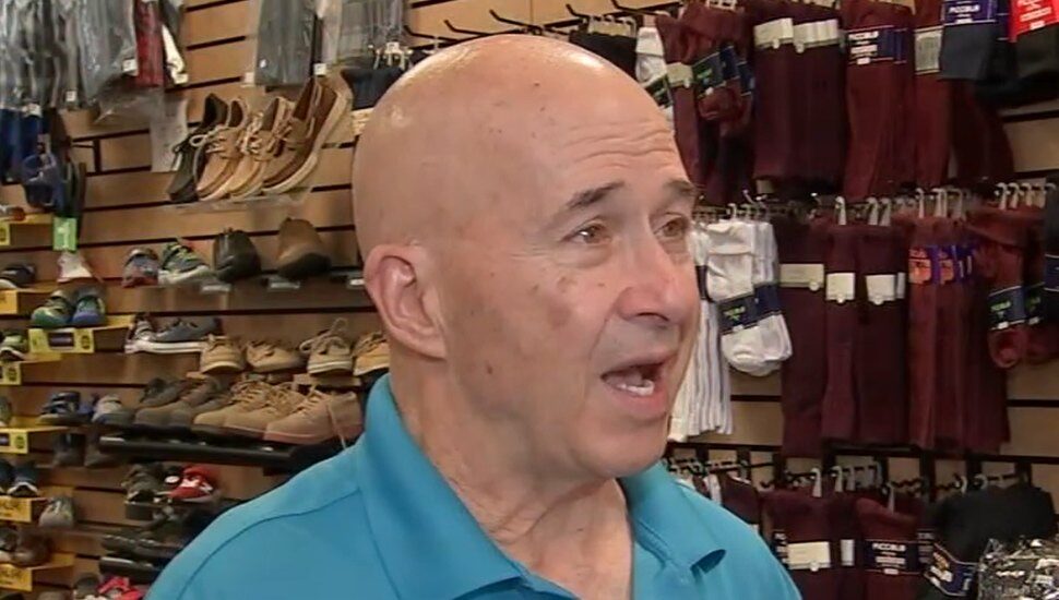 man in blue shirt