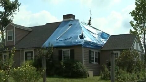 blue tarp on a home roof