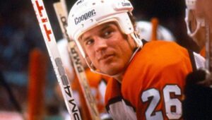 hockey player with orange jerse