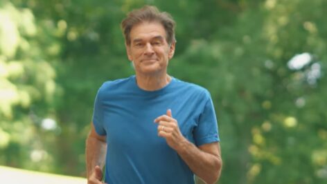 man in blue shirt jogging