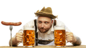 man in hat with beer