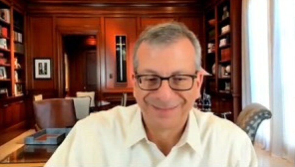 man with glasses, smiling