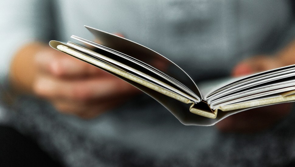 hand with book