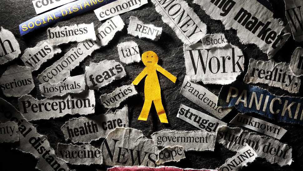 paper doll with headlines