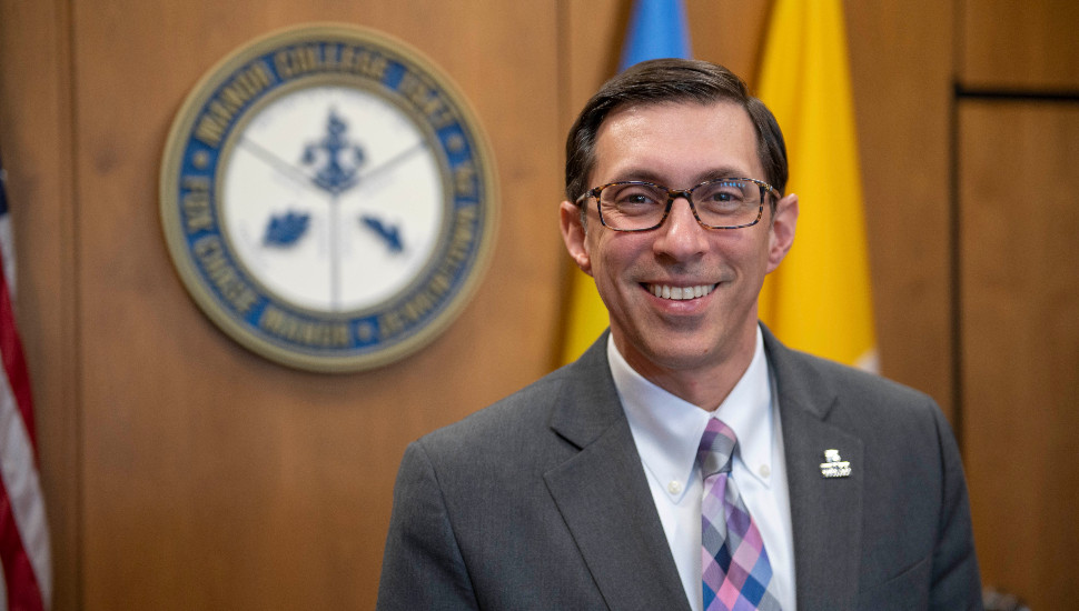 smiling man with glasses