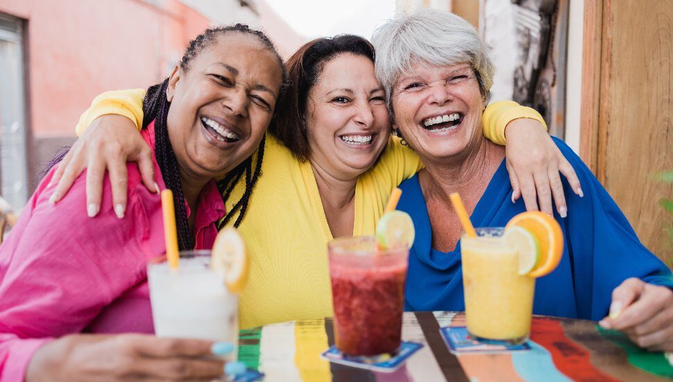 three women with drinks