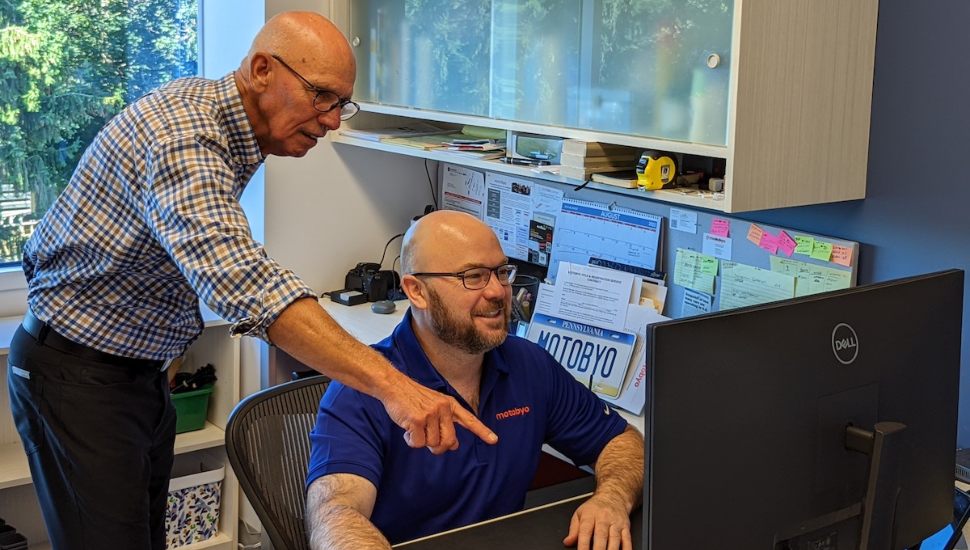 two men at a desk