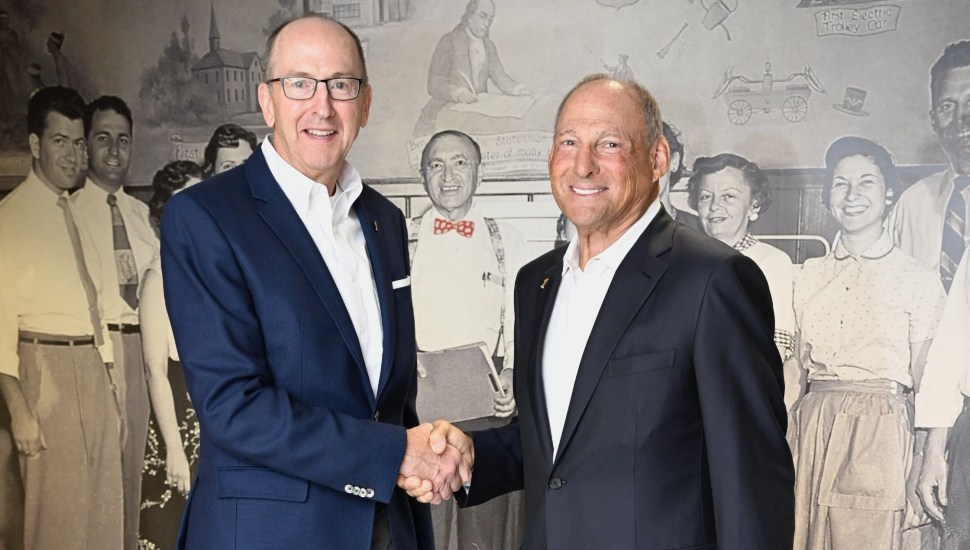 two men shaking hands