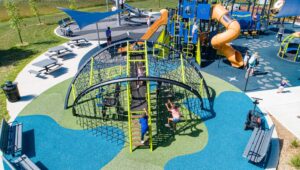 A playground with many pieces of modern equipment