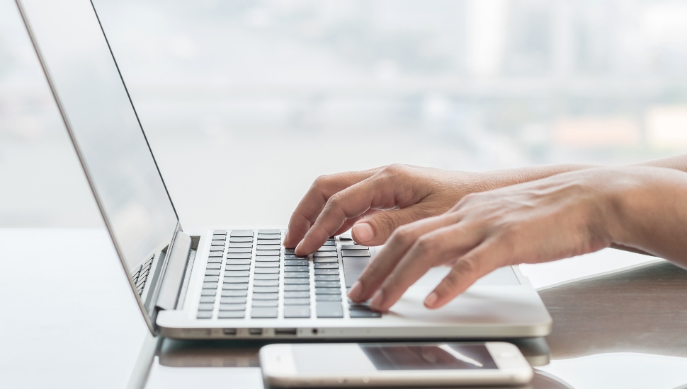 blog writer or business person using smart device working on internet communication technology