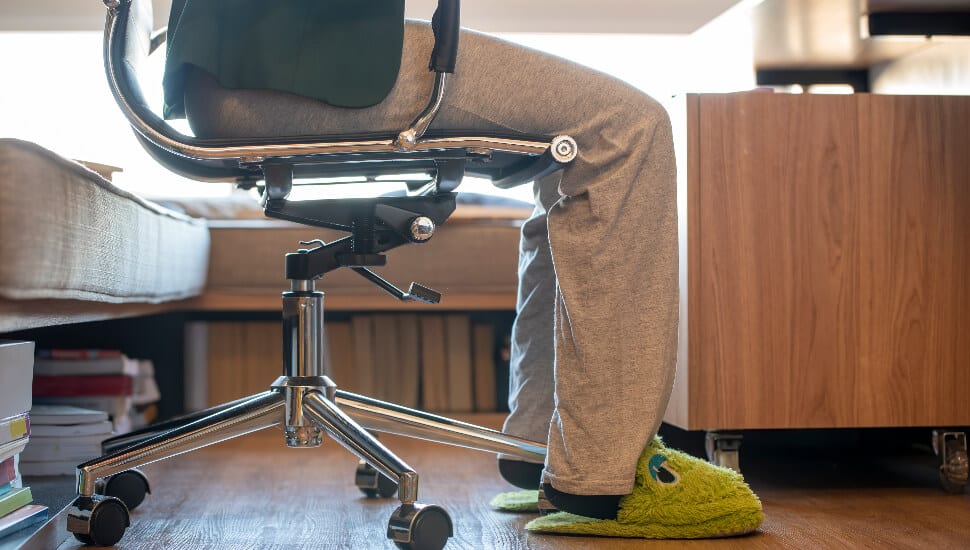 Man working from home wearing funcky slippers