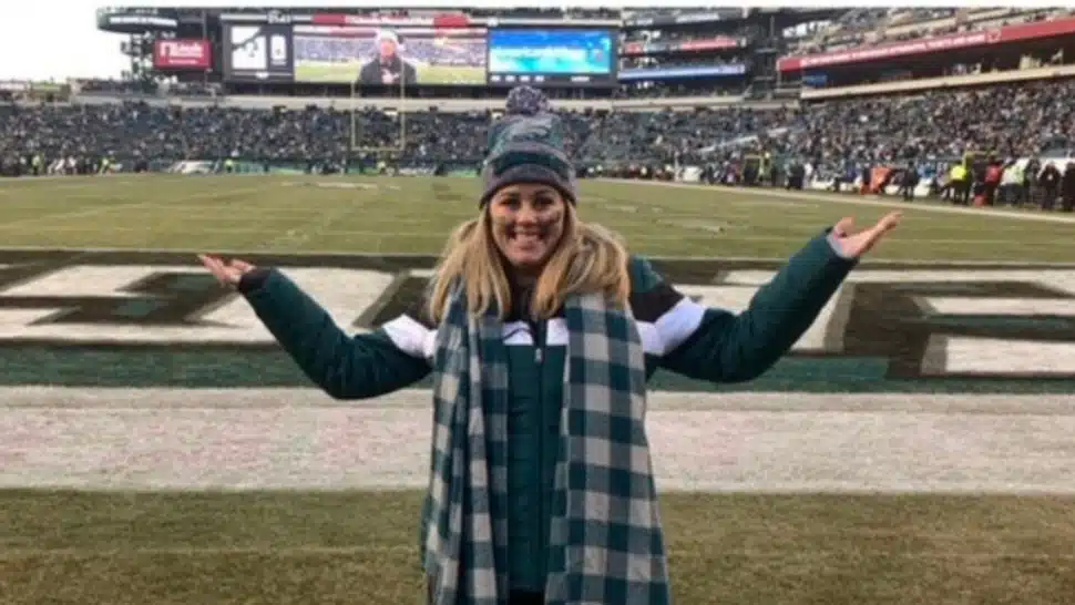 Allison Cawley, poses in Eagles gear
