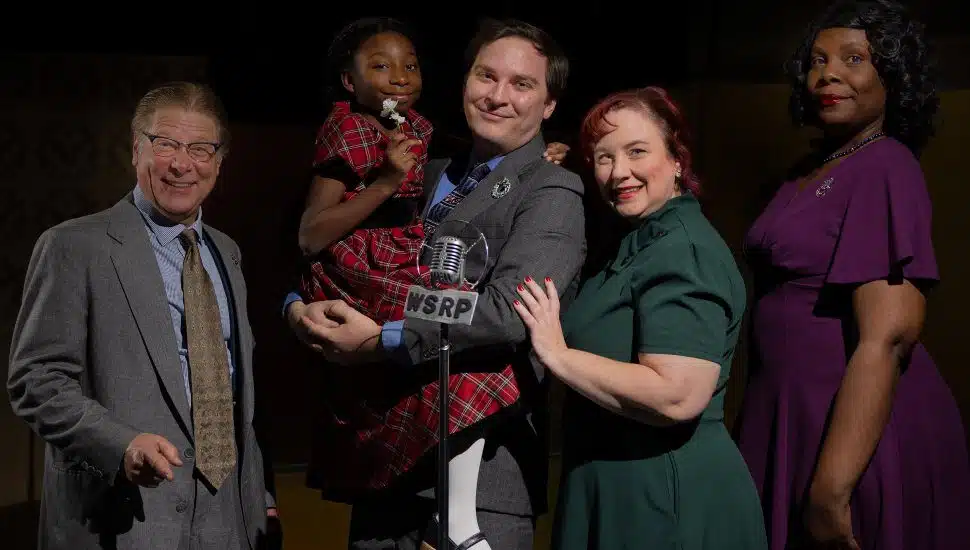 People in front of a microphone