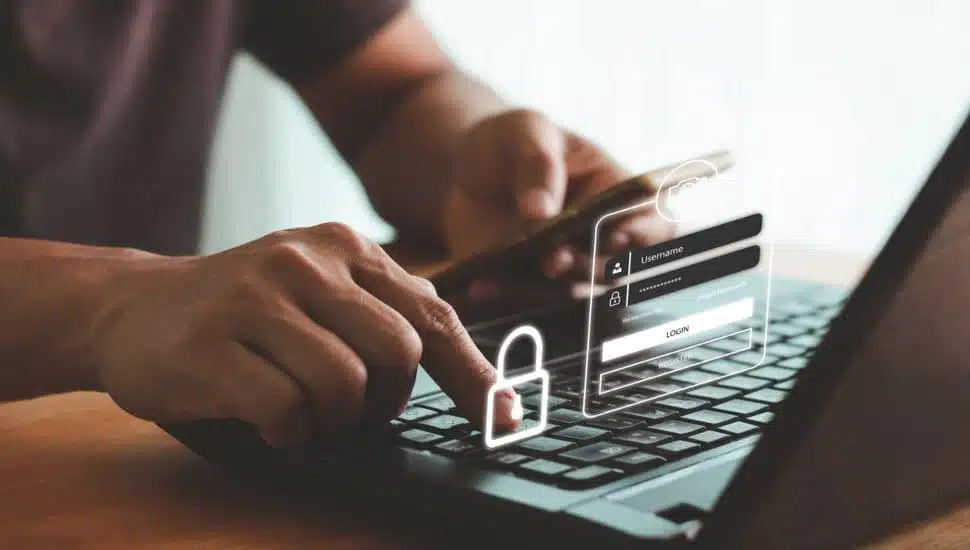 person logging into computer