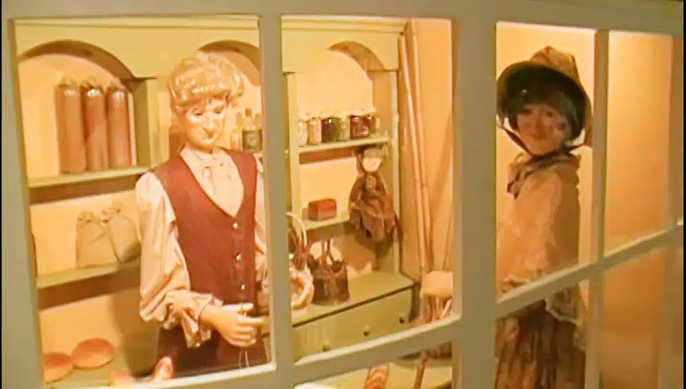 figures through a window