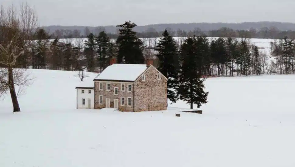 house in snowy field