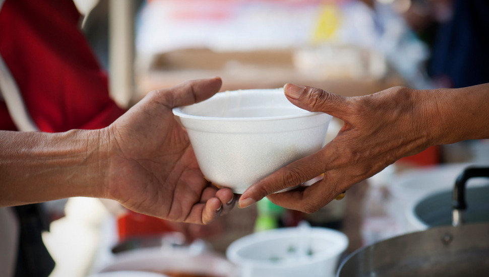 two hands holding a bowl