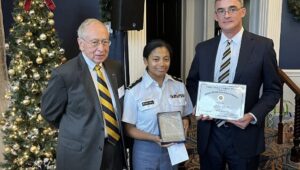 Valley Forge Cadet Dilia Reyes-Hill is standing with Gilbert Lappano, Commander USN (Retired) (left); and Charles Merwin, 1st Lt USA (Former)
