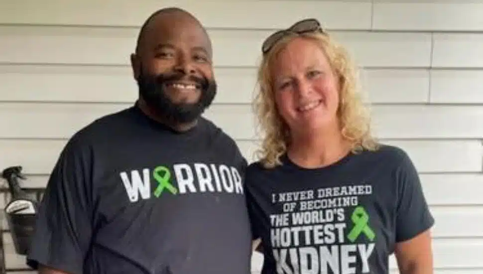 two people smiling
