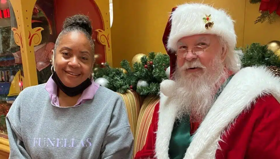 bearded man with woman in gray