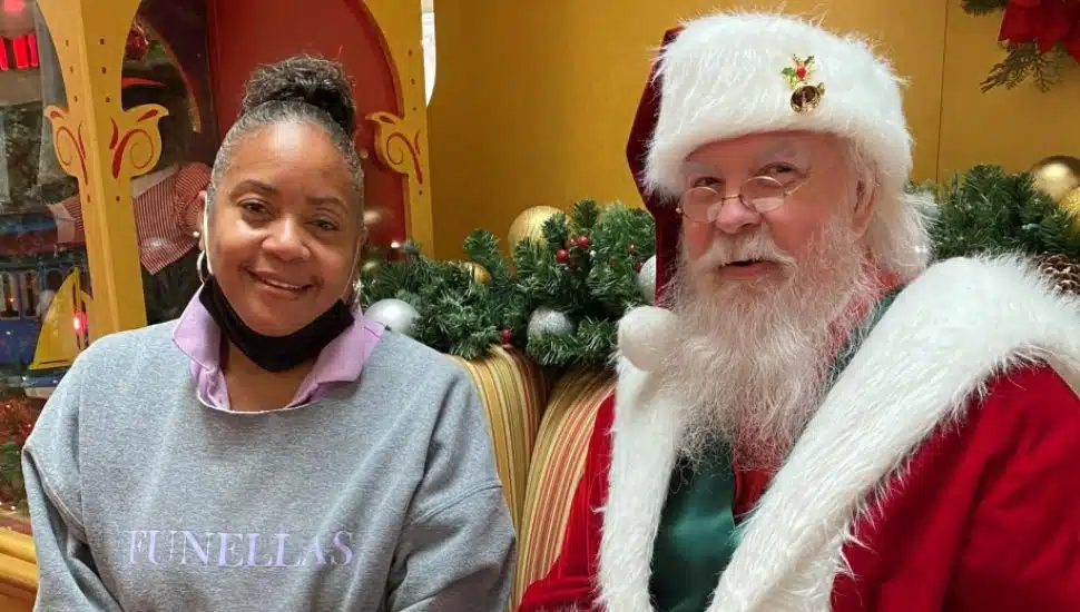 bearded man with woman in gray