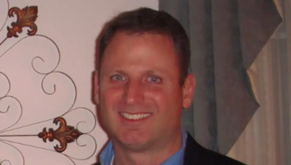 man in blue shirt henesey