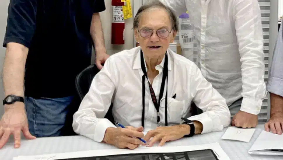 Julian Wasser seated at a table