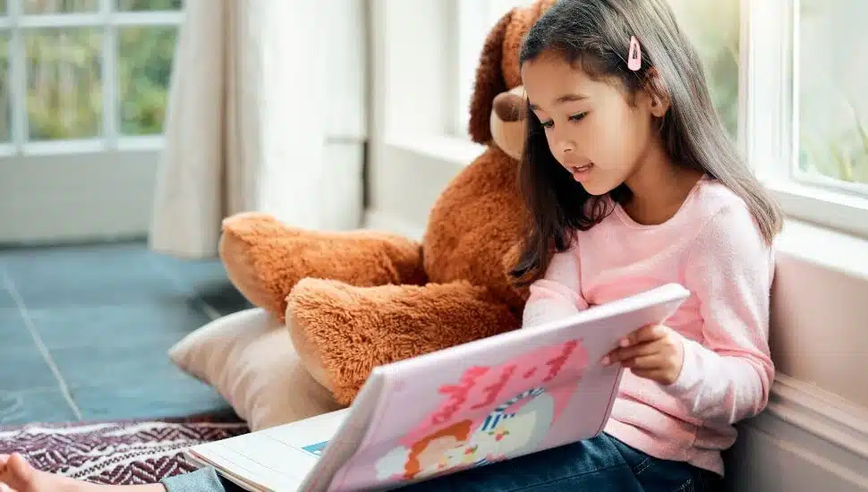 Young girl reading a book
