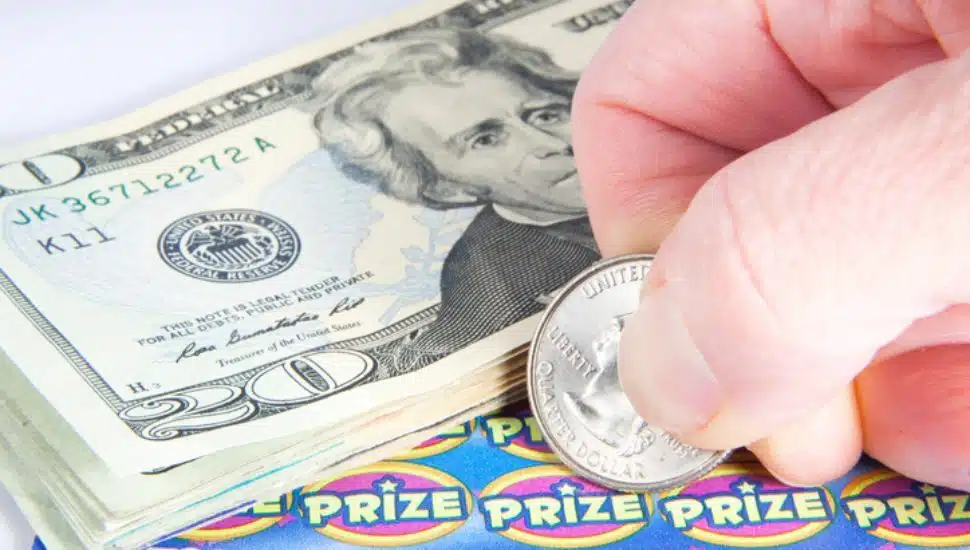 Pa Lottery hopeful scratching a ticket