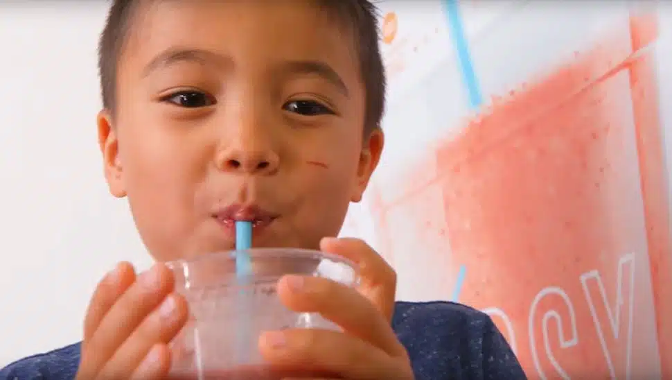 child drinking a Bleni blends