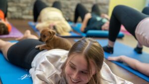 This puppy has carved his own yoga space on top of a youga student at a puppy yoga event recently at Neumann University
