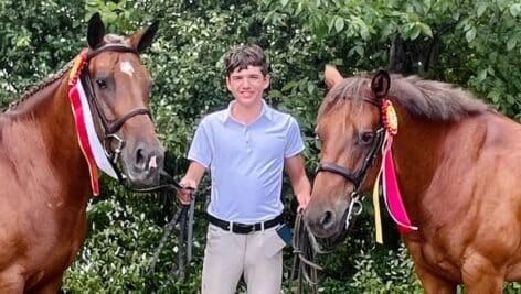 Liam Hissong and the two ponies he rides.