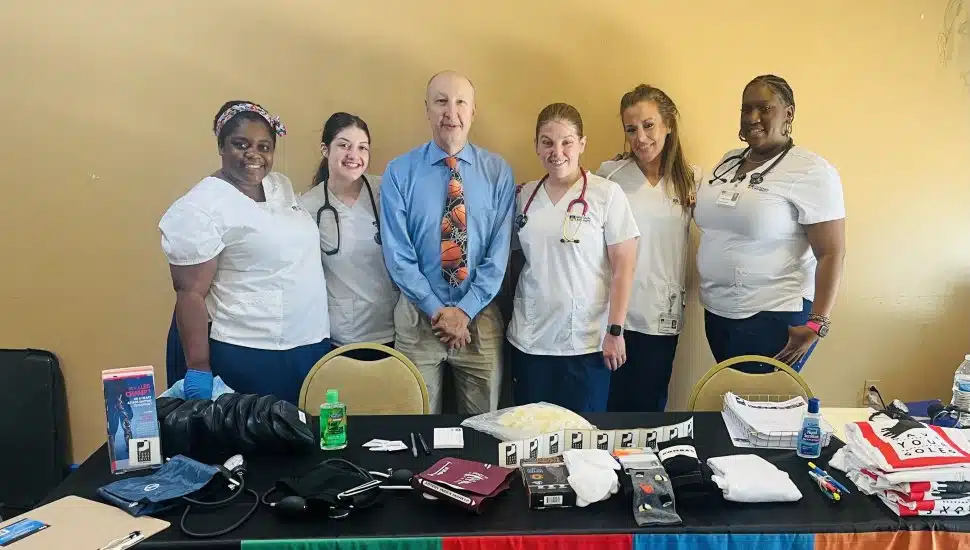 Dorcia Stringfield, Nicole Pierdomenico, Dr. Ron Renzi, Jillian Logue, Laura Millison, and Shauntay Russ volunteered at a health fair in Chester.