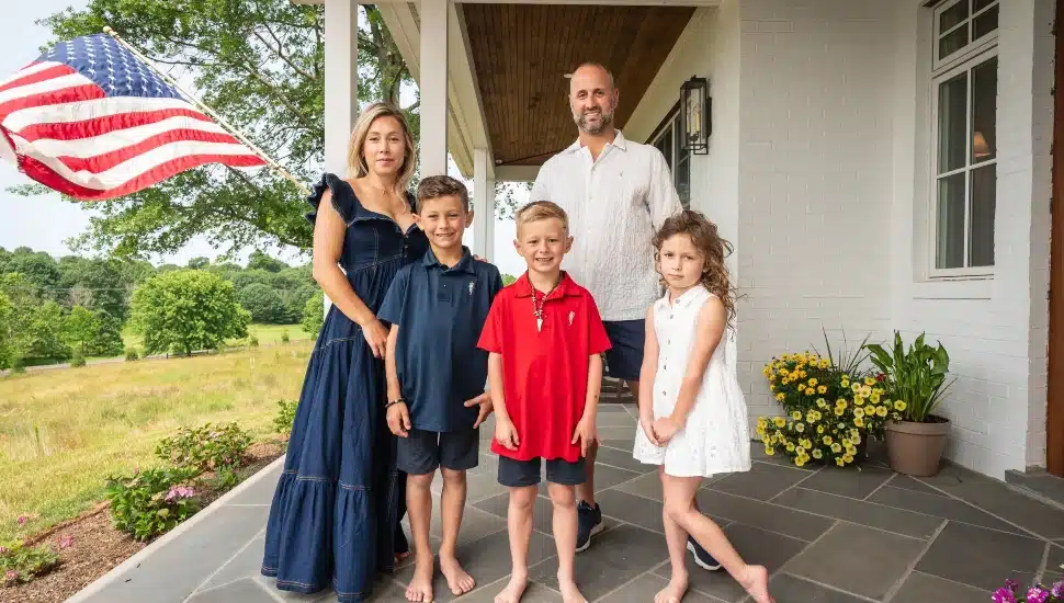 The Watson Family outside their home.