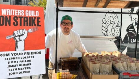 Adam Shapiro giving away free soft pretzels.