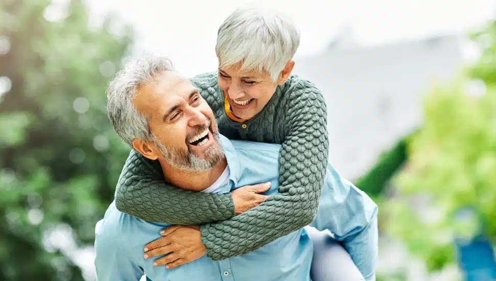 A senior couple having fun.