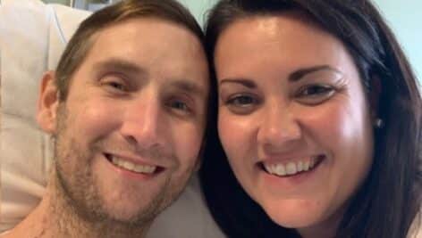 Patrick Brett and his wife Lauren in the hospital.