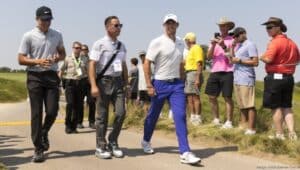 Rory McIlroy (center) has made an investment in Lyric.