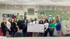 Constellation Energy Corporation presenting check to Upward Bound students.