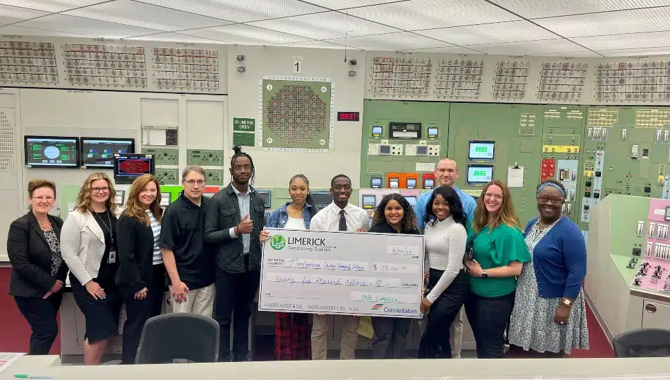 Constellation Energy Corporation presenting check to Upward Bound students.