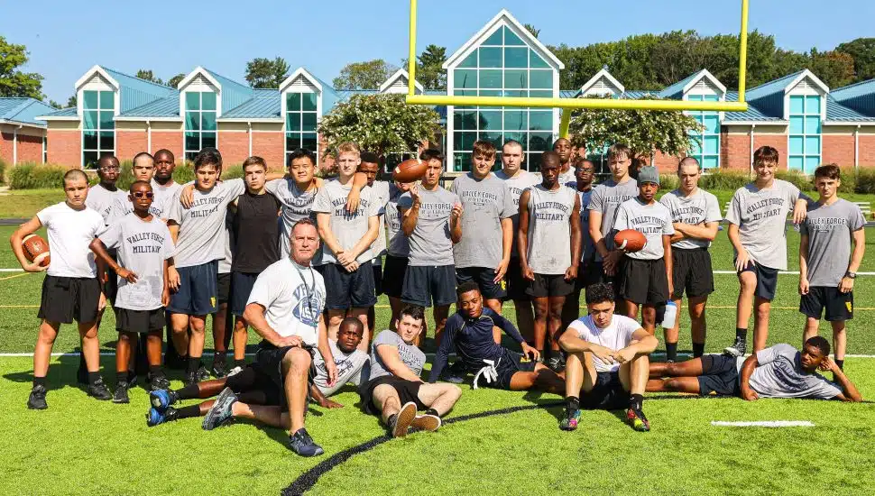 Newly named VFMA head football coach, Robert Rosato, (Row 1, far left) with the Fall 2023 VFMA football team.