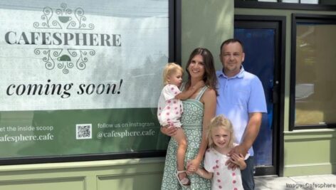 Magdalena Pasciak with husbnd Pawel and their two children outside the entrance to Cafesphere, opening soon in Media.