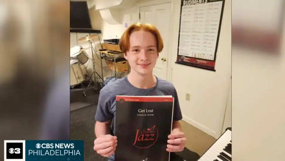 Colin Plank holding hhis composition "Get Lost"