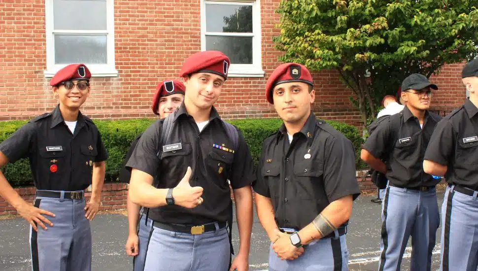 Seven VFMC Cadets stand outside a building at the Valley Forge Military Academy & College They are graduates of the 2023 class of VFMA. College -- four are part of the Early Commissioning Program and three are Citizen Leaders.