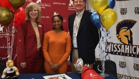 Gwynedd Mercy University President Deanne H. D’Emilio (left) and Wissahickon School District Superintendent James Crisfield, (right) presented Cinai Lazarus (center) with the scholarship.