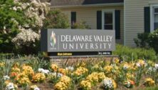 A sign for Delaware Valley University.