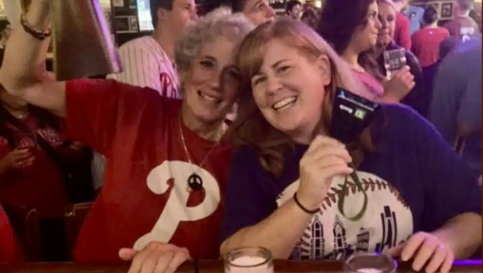 Customers cheering on the Phillies at McGillin's Old Ale House.