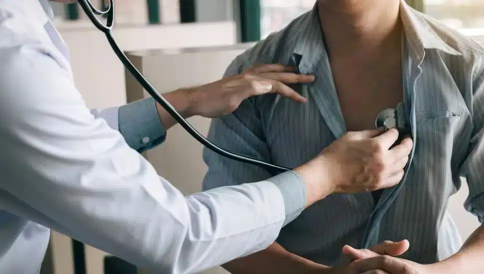 A doctor giving a patient a checkup.